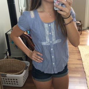 light blue American eagle top with lace detail